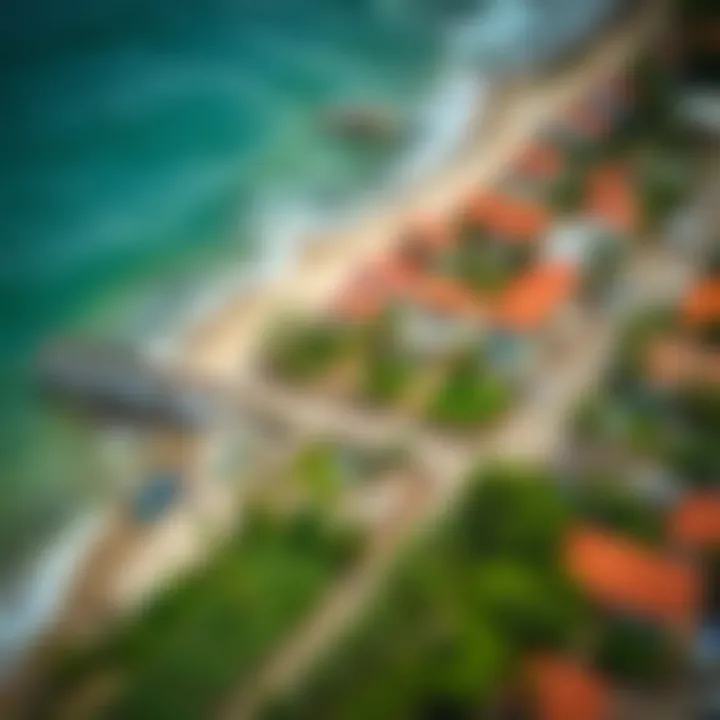 Aerial view of a coastal community with protective barriers and green spaces to reduce disaster impact